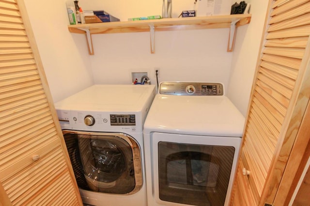 laundry area with washer and dryer