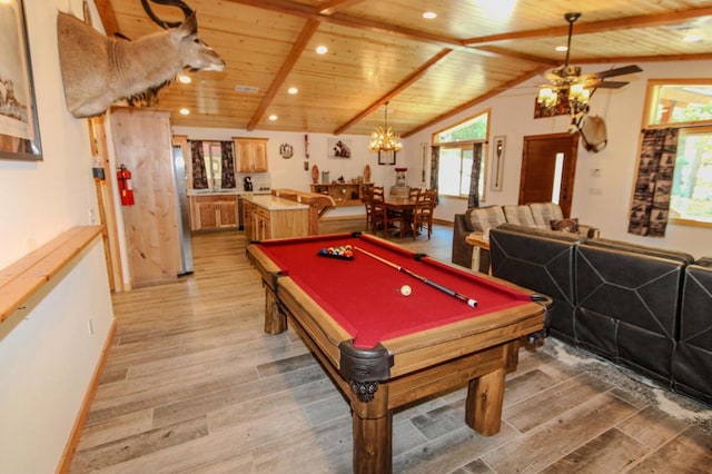 recreation room featuring wood ceiling, a healthy amount of sunlight, and lofted ceiling with beams