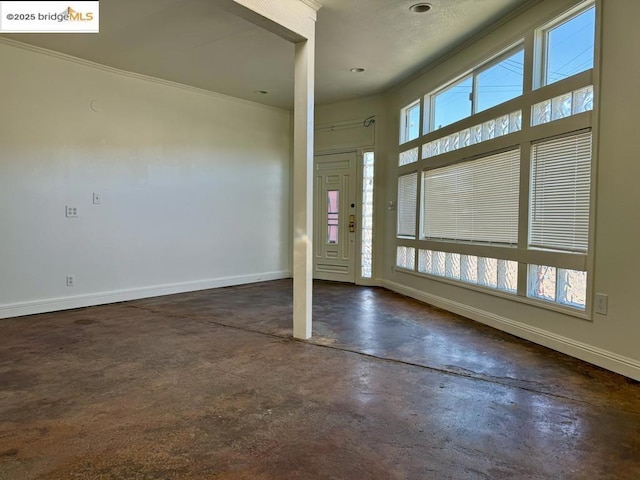 foyer entrance with ornamental molding