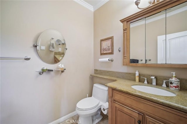 bathroom with ornamental molding, vanity, toilet, and tile patterned flooring