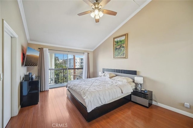 bedroom with ceiling fan, lofted ceiling, ornamental molding, and wood-type flooring