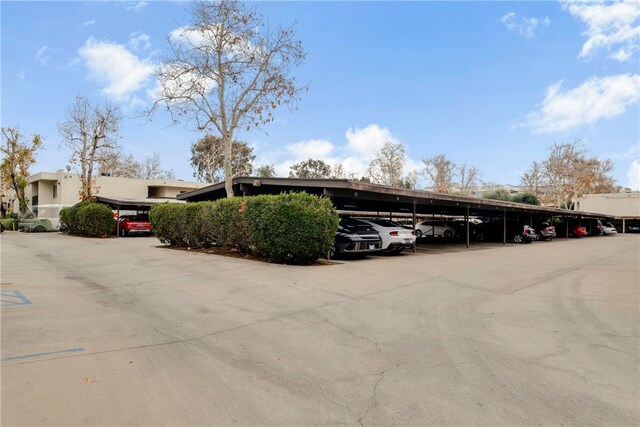 view of parking featuring a carport