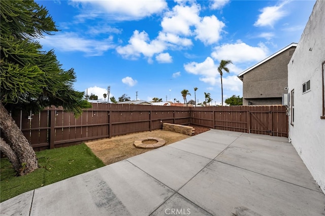 view of patio / terrace featuring a fire pit