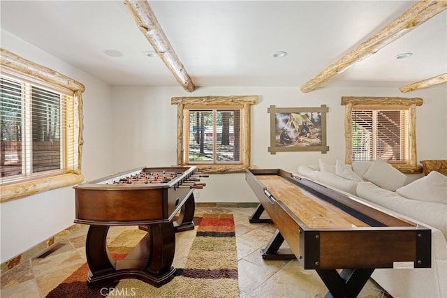 playroom featuring beamed ceiling