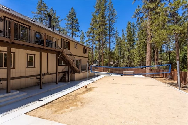 view of property's community featuring volleyball court