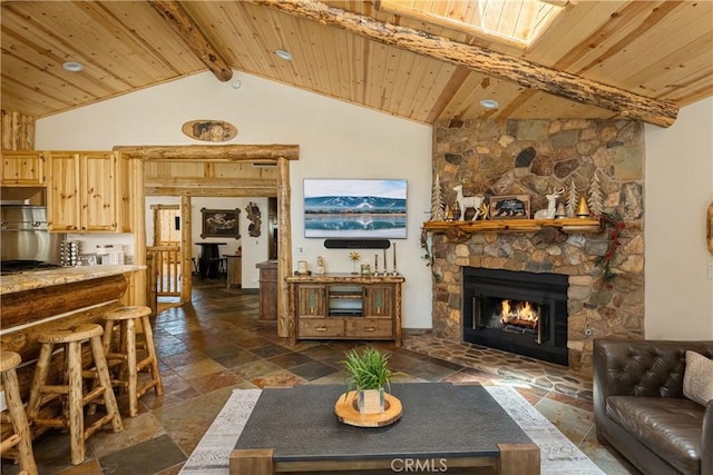 living room featuring a stone fireplace, lofted ceiling with skylight, and wooden ceiling