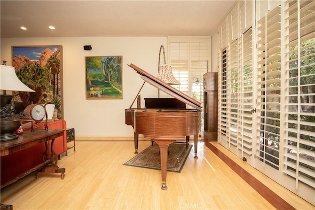 miscellaneous room with light wood-type flooring