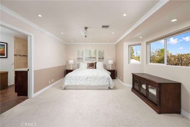 carpeted bedroom with crown molding