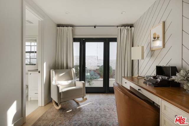 living area featuring light hardwood / wood-style floors