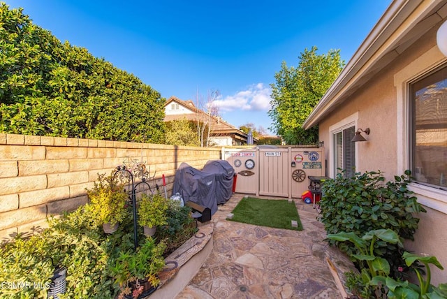 view of patio / terrace with a grill