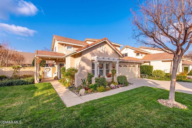 view of front facade with a garage and a front lawn