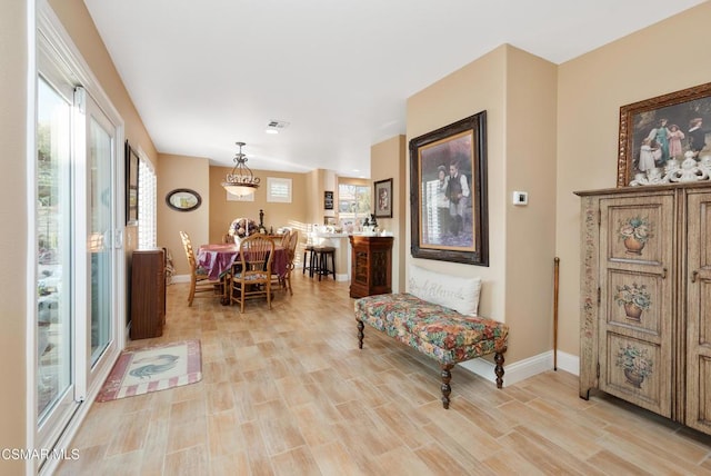 living area with light hardwood / wood-style floors