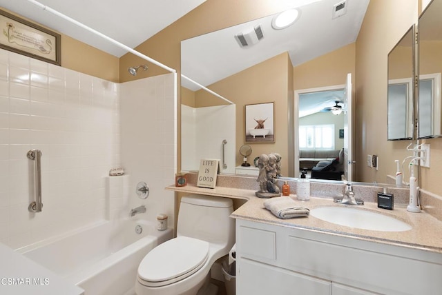 full bathroom with shower / tub combination, lofted ceiling, vanity, ceiling fan, and toilet