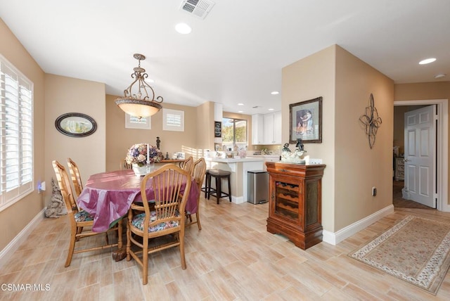 dining room with light wood-type flooring