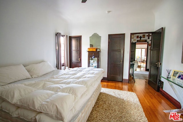 bedroom featuring hardwood / wood-style floors