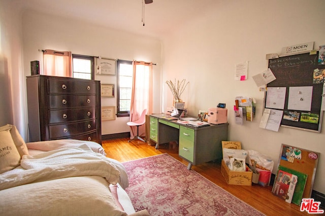 bedroom with light hardwood / wood-style floors