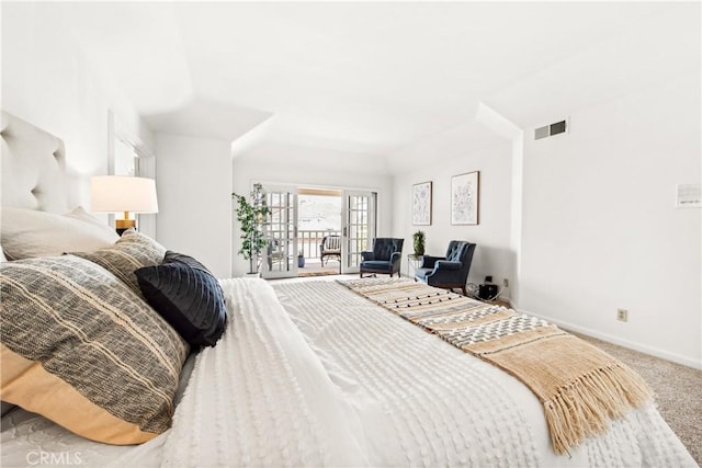 bedroom featuring access to outside, baseboards, visible vents, and carpet flooring