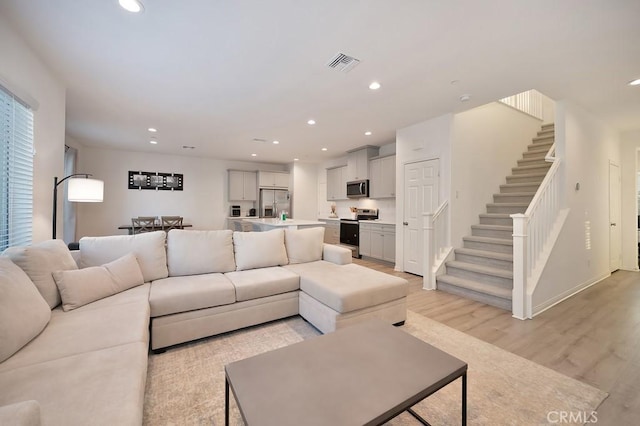 living room featuring light hardwood / wood-style floors