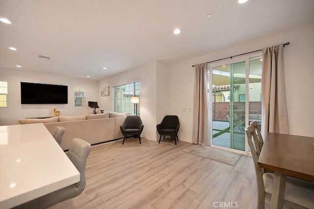 office with light hardwood / wood-style flooring