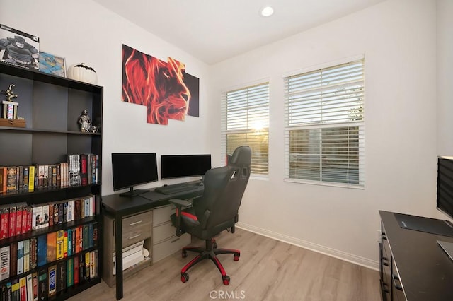 home office with light wood-type flooring