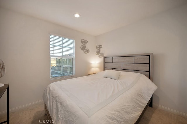 bedroom with light carpet