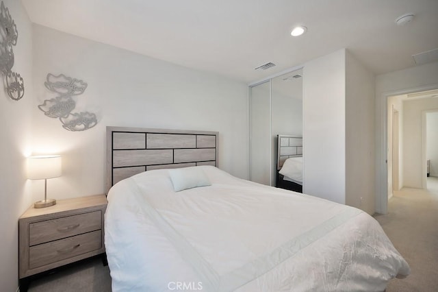 bedroom featuring a closet and carpet