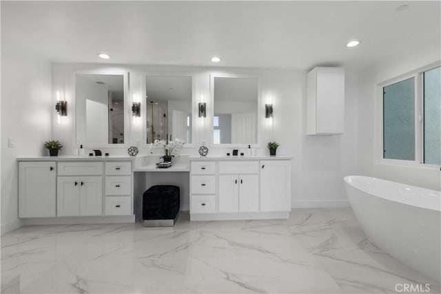 bathroom featuring independent shower and bath and vanity