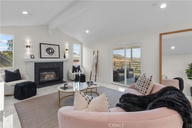 living room with a premium fireplace and vaulted ceiling with beams