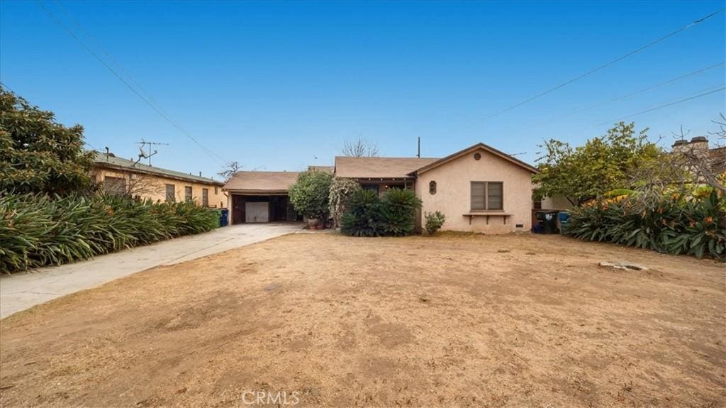 single story home with a garage