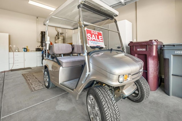 garage featuring gas water heater