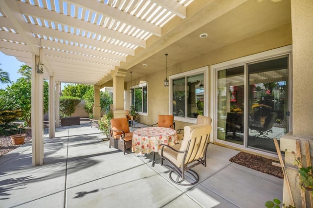 view of patio / terrace with a pergola and an outdoor hangout area