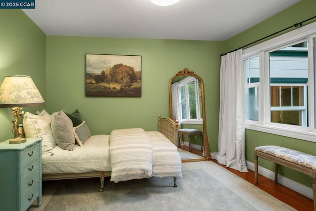 bedroom featuring hardwood / wood-style flooring