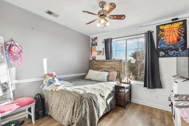 bedroom with light hardwood / wood-style flooring