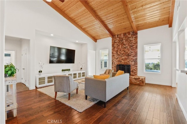 living room with dark wood-type flooring, beam ceiling, wood ceiling, high vaulted ceiling, and a fireplace