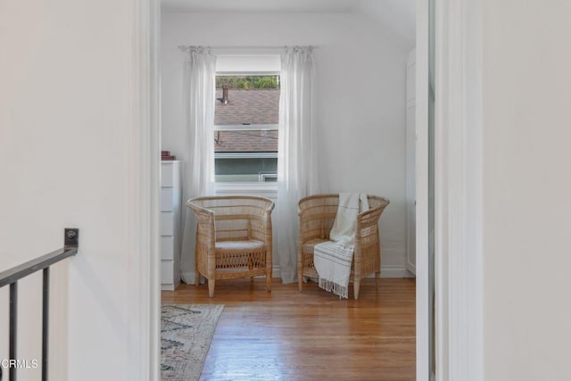 sitting room featuring hardwood / wood-style floors