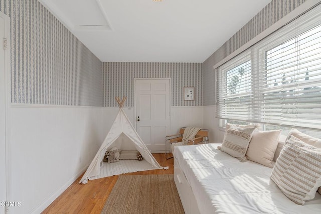 bedroom with wood-type flooring