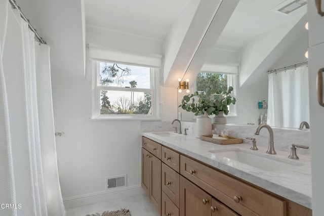 bathroom featuring vanity