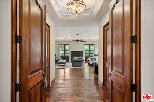 entrance foyer featuring ceiling fan and dark hardwood / wood-style flooring