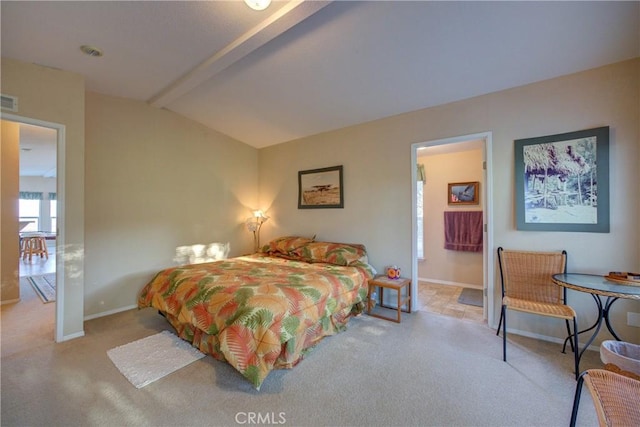 carpeted bedroom with vaulted ceiling with beams