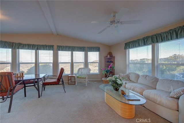 carpeted living room featuring lofted ceiling with beams, a water view, and ceiling fan