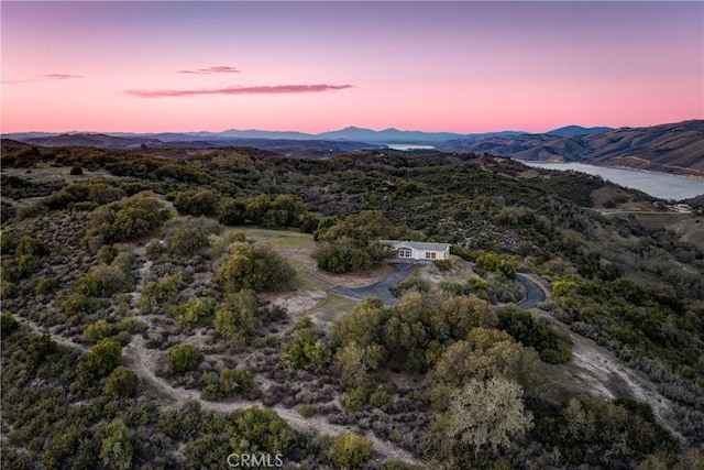 aerial view at dusk with a mountain view