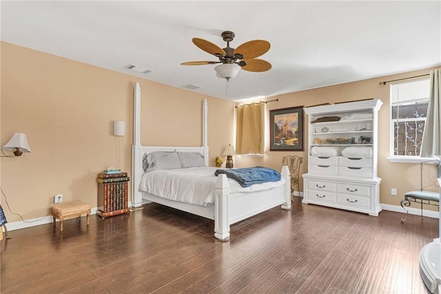 bedroom featuring dark hardwood / wood-style floors and ceiling fan