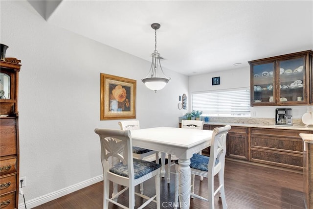 dining room featuring dark hardwood / wood-style floors