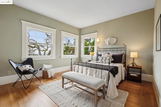 bedroom featuring hardwood / wood-style flooring