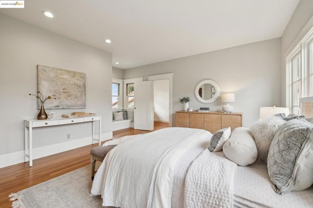 bedroom featuring light wood-type flooring