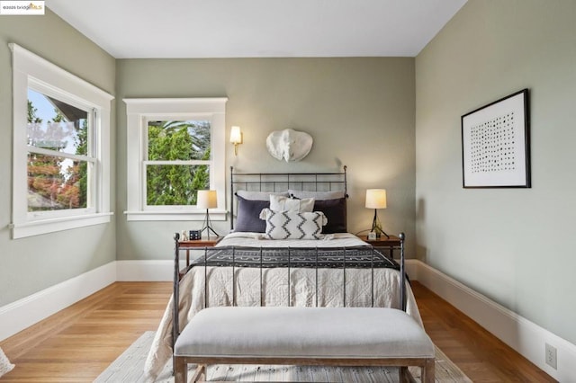 bedroom featuring hardwood / wood-style flooring