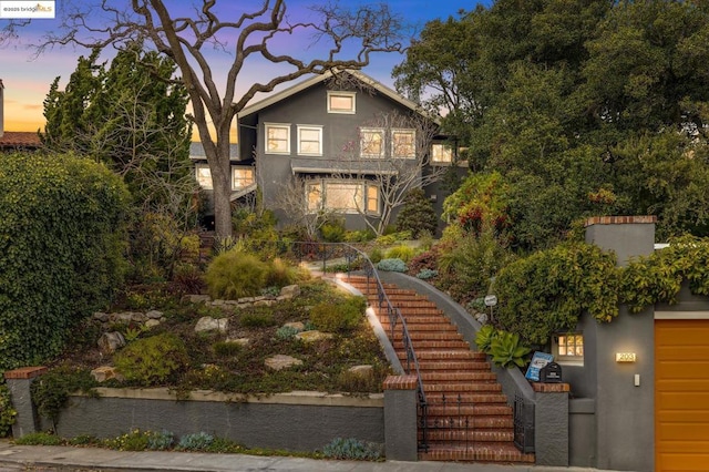 view of front of property with a garage