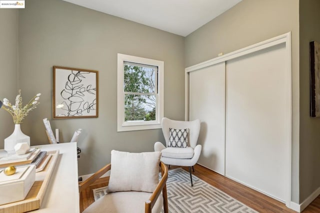 sitting room featuring hardwood / wood-style flooring