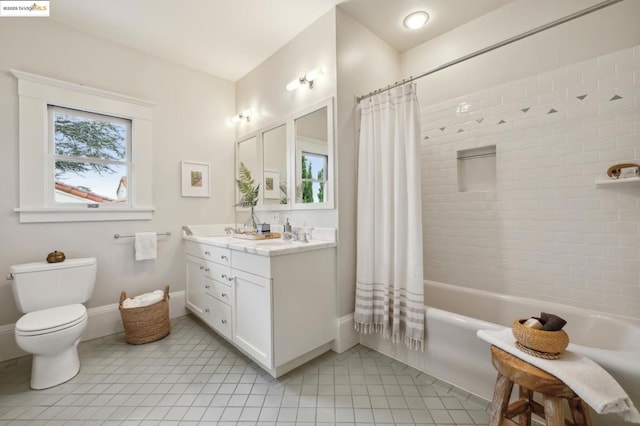 full bathroom featuring tile patterned flooring, vanity, shower / tub combo with curtain, and toilet