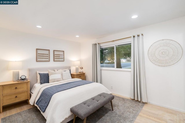 bedroom with light wood-type flooring